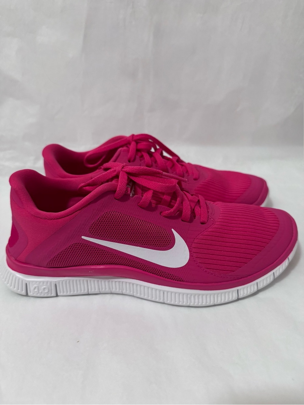 Nike Free 4.0 V3 pink running shoes.